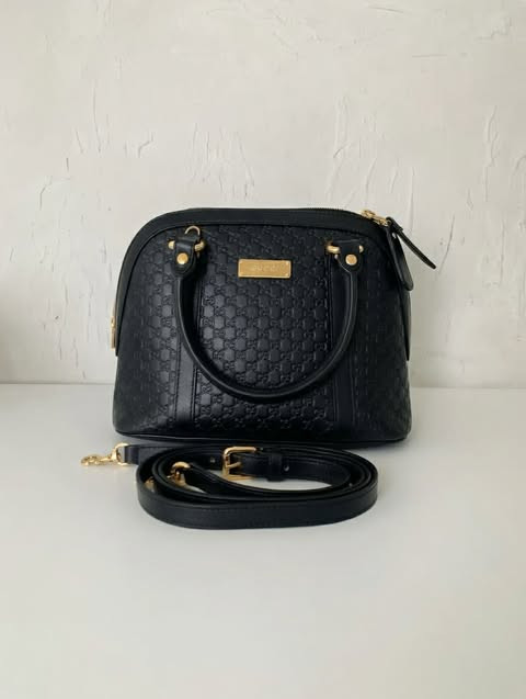 Gucci GG Embossed Dome Bag