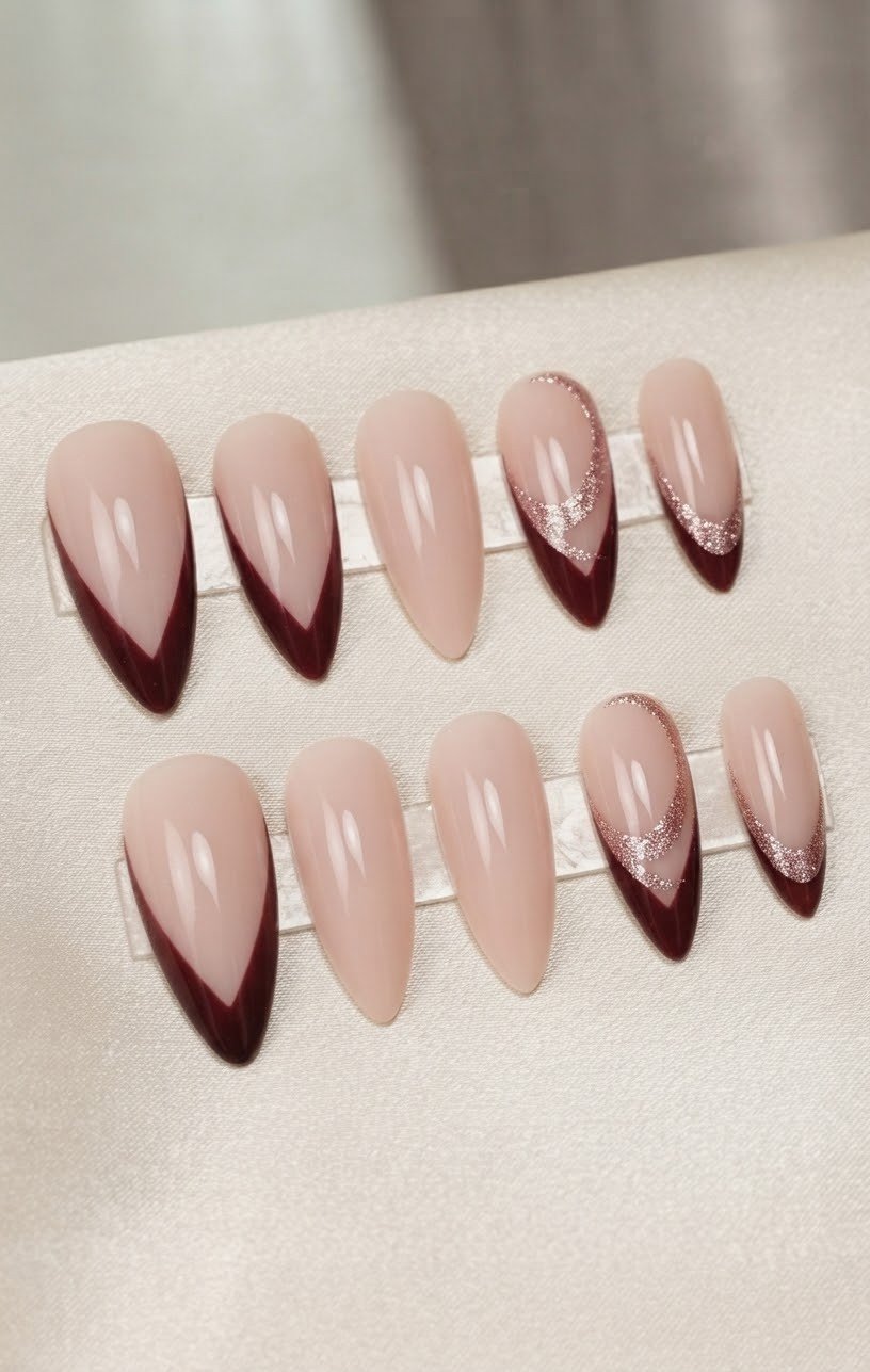Burgundy V-Tip French Manicure with Glitter Swirl Accents