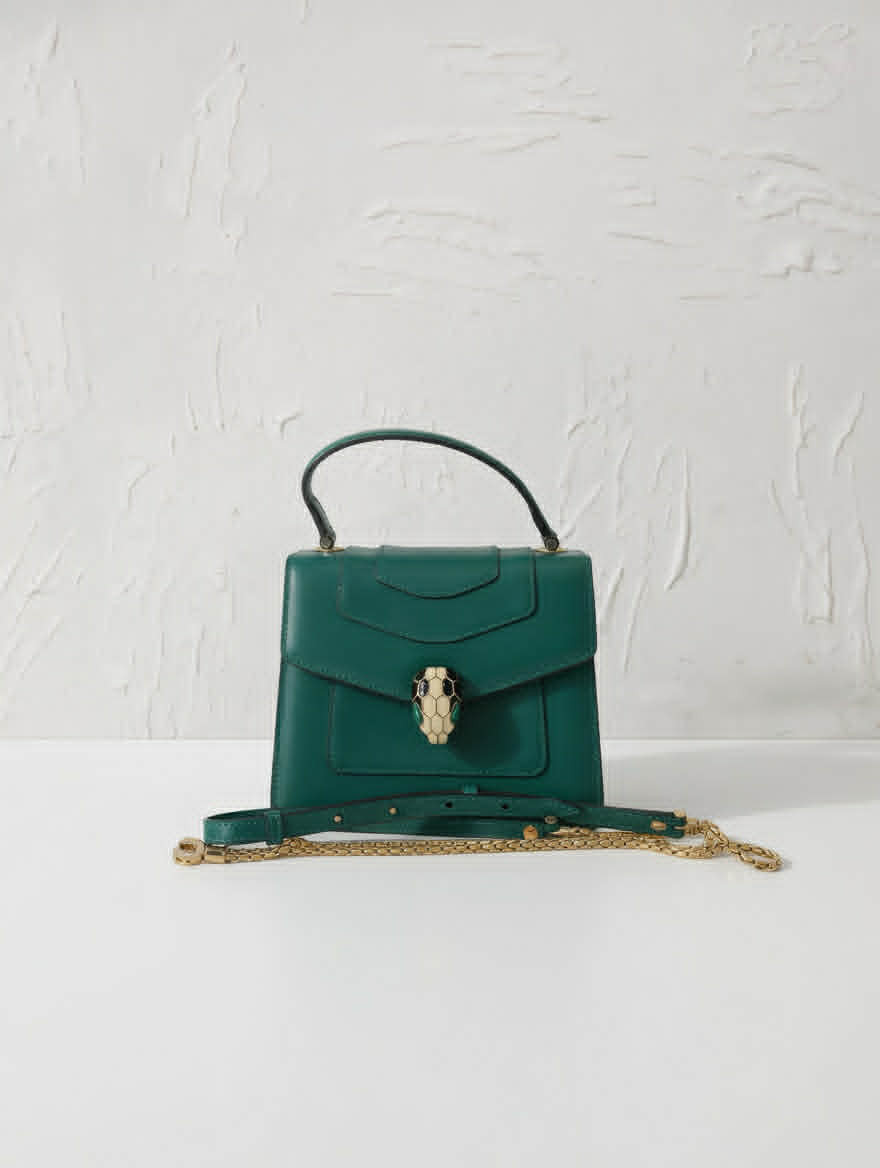 Bulgari Serpenti Forever Top Handle Bag in striking Emerald Green.